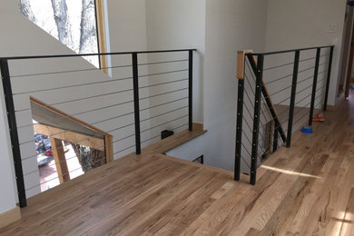 Example of a trendy staircase design in Denver