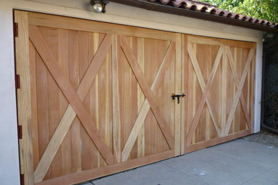 Wooden swing garage door.