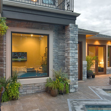 Traditional Exteriors Featuring Stone