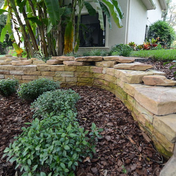 Natural Stone Dry-Stack Retaining Walls with Dry-Laid Stone Pathways