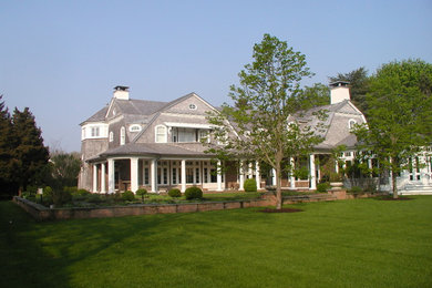 Photo of a traditional full sun side yard brick outdoor basketball/tennis/multi-game court in New York for summer.