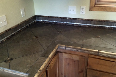 Kitchen - kitchen idea with medium tone wood cabinets and tile countertops