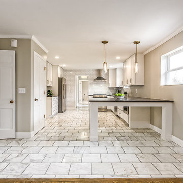 Cluttered cook space to open kitchen reconfiguration