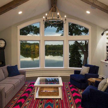Weathered Antique Box Beams on a Vaulted Ceiling in a Lake Home Living Room