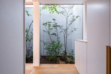 Example of a minimalist patio design in Other