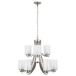 Yosemite Home Decor - Modern Classic 9-Light Chandelier, Satin Nickel - Brighten any room that needs a boost with the transitional design of the Modern Classic chandelier by Yosemite Home Decor. The sleek, gently curved arms accented with an satin nickel finish gently slope down to hold incredibly beautiful frosted shades. Although this chandelier only requires a minimal amount of wattage it is sufficient for a variety of spaces that require strong illumination without any glare. Requires 9 60-watt candelabra (E12) incandescent bulbs (not included with purchase).