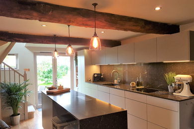Design ideas for a medium sized kitchen in Sussex.