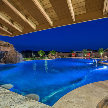 Natural Stone Freeform Pool + Perimeter Overflow Spa