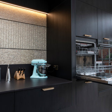 Black and Brass kitchen in Canterbury