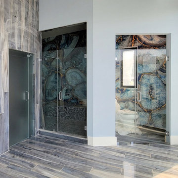 Multiple Hinged Glass Doors in a Luxury Bathroom