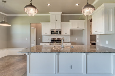 Inspiration for a mid-sized industrial kitchen remodel in Oklahoma City