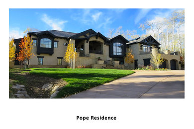 Example of a large classic home design design in Denver