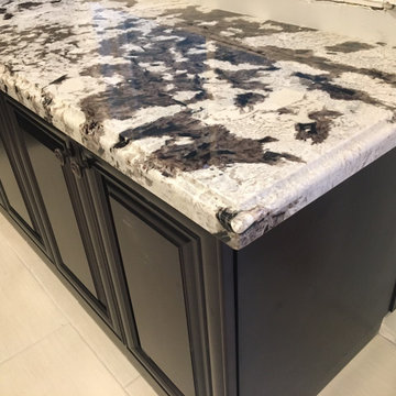 Dark espresso kitchen cabinets with Granite countertop