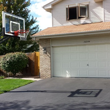 Tom Z's Pro Dunk Silver Basketball System on a 35x18 in Orland Hills, IL