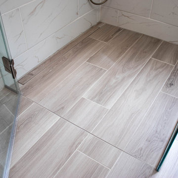 Siteline White Vanity, Barrier Free Walk-in Shower and Free Standing Tub