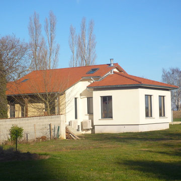 une maison restructurée une extension créée a Toussieu