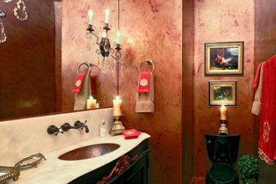 Tuscan medium tone wood floor bathroom photo in Salt Lake City