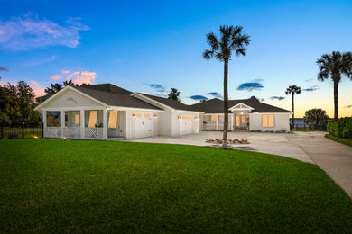 Inspiration for a coastal garage remodel in Jacksonville
