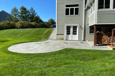 Patio - mid-sized backyard stone patio idea in Portland Maine