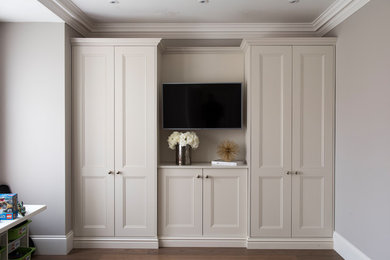 This is an example of a traditional bedroom in Surrey.