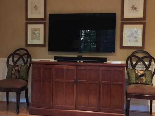 sconces on either side of tv