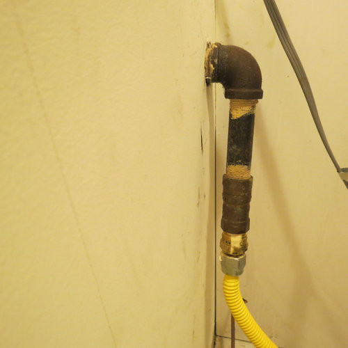 Range not flush with wall. Large gap!
