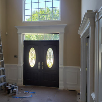 Expansive entry door trim