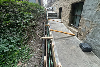 Curb/Exterior Wall Stucco/ParaPro Flashing/Garage slab replacement/Drainage