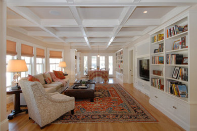 Huge elegant open concept light wood floor family room photo in Boston with a media wall