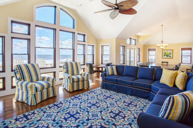 Example of a beach style home design design in Other
