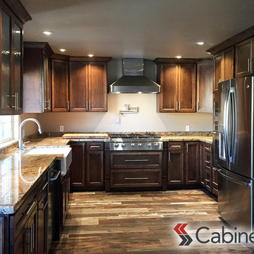 Beautiful Dark Kitchen featuring Belleair Maple Pecan Cabinetry