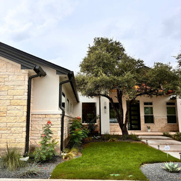 Black seamless gutter installation - Custom home in Georgetown, Texas