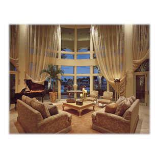 Inspiration for a large mediterranean formal open plan living room in Miami with beige walls, travertine flooring and no tv.