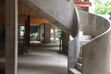 Helical concrete stairs with Concrete balustrade