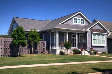 Example of a mixed siding exterior home design in New Orleans