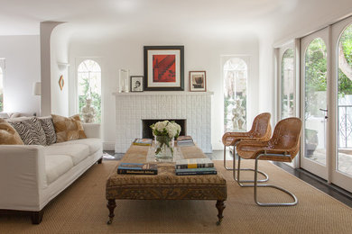 Living room - contemporary formal and open concept dark wood floor and brown floor living room idea in Los Angeles with white walls and a standard fireplace