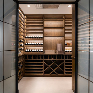 Modern Glass-Enclosed Wine Cellar with Custom Oak Racking | Chicago