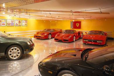 Example of a large trendy attached four-car garage design in San Francisco