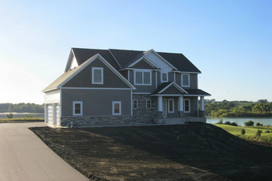 Example of an arts and crafts exterior home design in Minneapolis