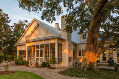 Elegant mixed siding exterior home photo in Other