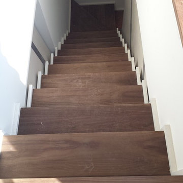 Custom walnut stairs & wet bar Soho- New York, NY