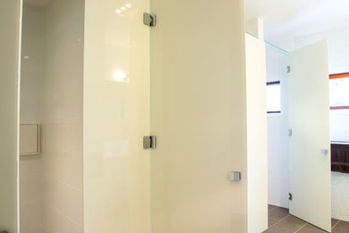 Frameless shower screens made from toughened Laminated Glass
