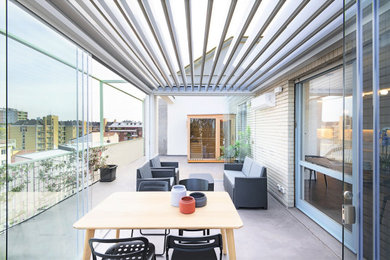 Immagine di una veranda design