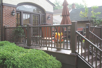 Deck - mid-sized traditional backyard deck idea in New York with no cover