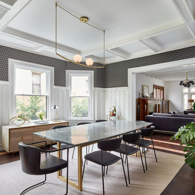 Enclosed dining room - mid-sized eclectic dark wood floor, coffered ceiling, wainscoting and wallpaper enclosed dining room idea in New York with multicolored walls