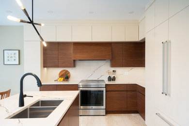Inspiration for a mid-sized mid-century modern l-shaped ceramic tile and beige floor eat-in kitchen remodel in Toronto with an undermount sink, flat-panel cabinets, medium tone wood cabinets, quartz countertops, white backsplash, quartz backsplash, paneled appliances, an island and white countertops