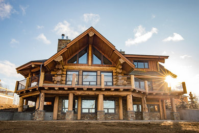 Inspiration for a huge rustic home design remodel in Calgary