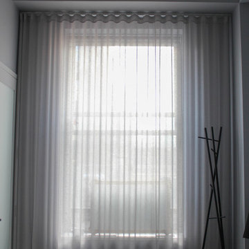 A loft 1 br condo with sheer seamless drapery