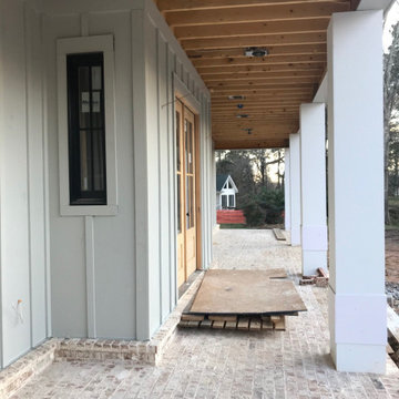 In Progress: generous front porch, charming entry