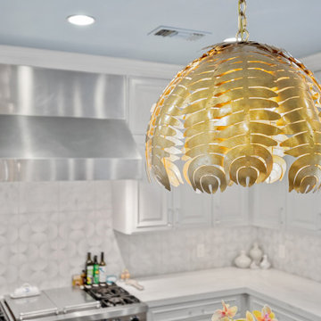 Bright and Elegant Kitchen with Glass Dining Table and Custom Cabinetry